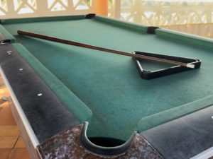 Pool table showing the care needed for pool table moving to protect the floor and table integrity